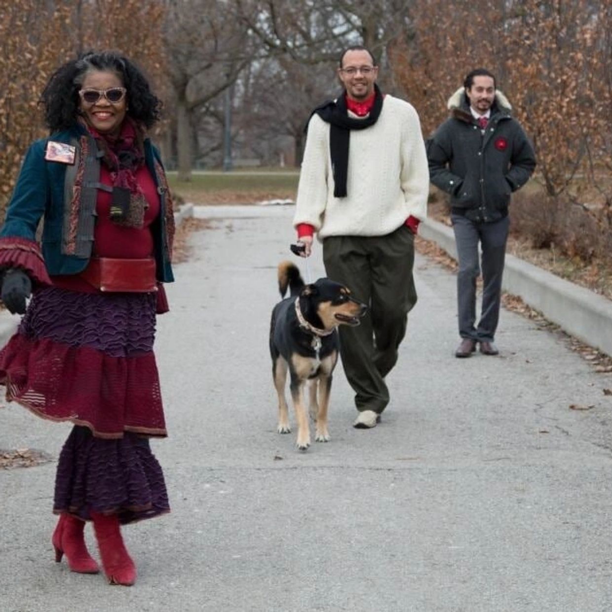 Jennifer Monteith walking with family and a dog